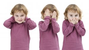 three pictures of the same child isolated on white and put together